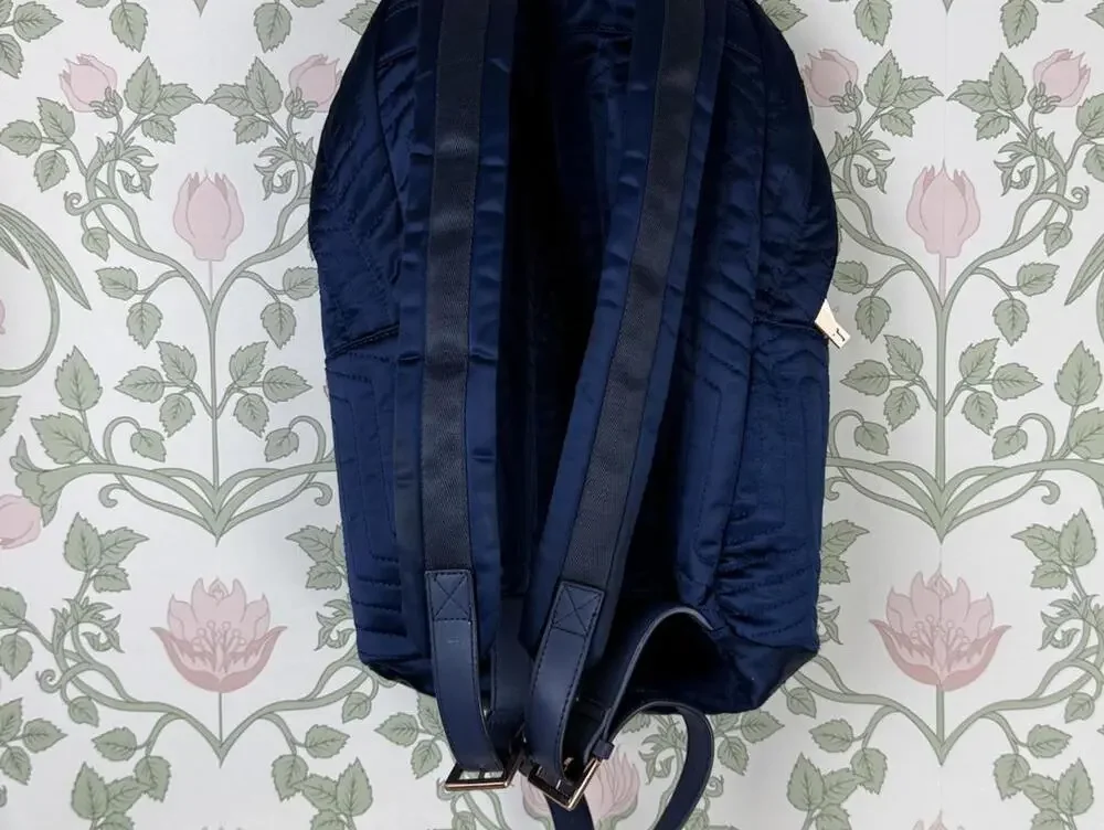 Ted Baker Akija Navy and Rose Gold Quilted Bow Backpack
